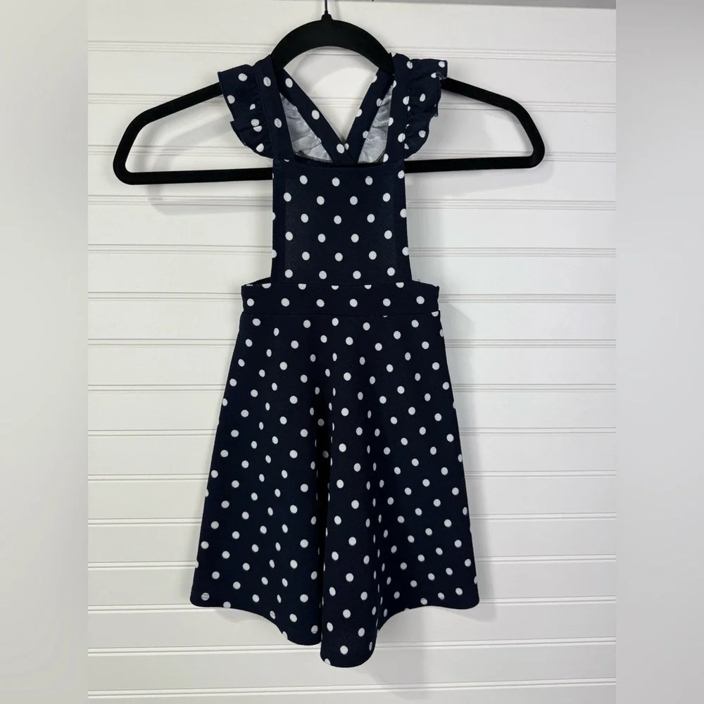 Heart & Arrow polka dot navy ruffle jumper. Girls size 4